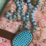 Handmade Sparkling Blue Beaded Necklace with Oval Pendant for a Glamorous Look Photo 0