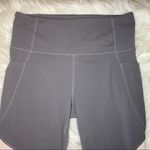 Athleta Powervita Salutation Stash Modblock Tight Photo 3