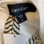 Karen Kane  Amber Waves Feather Print Tee Photo 8
