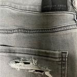 American Eagle Women's Stretch frayed Jeans and cute long sleeve camo top Photo 5