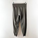 Vuori Daily High Rise Jogger Leggings in Oregano Green Medium Photo 3