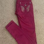 Miss Me  Skinny Jeans with Rasberry Angel Wing Bedazzled Rhinestone Back Pockets Photo 0