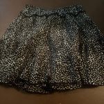 Black and White Mini Skater Skirt with Ruffled Smocked Design Photo 1