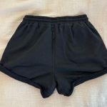 Princess Polly  black sweat shorts cuffed Photo 1