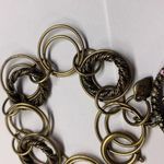 Signed SR Made In USA Costume Jewelry Bracelet With Spinning Hula Girl Charm Photo 10