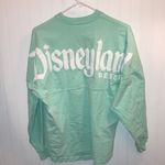 spirit jersey retired sea-foam green and white from Disney land S Photo 2