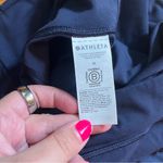 Athleta  ultra high rise elation 7/8 tight in navy blue size medium Photo 3