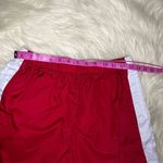 Nike red/white athletic shorts sz Medium Photo 3