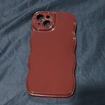 Iphone 15 plus wavy burgundy case. Used once! Red Photo 0