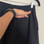 Alo Yoga CLUBHOUSE SKORT SIZE SMALL BLACK COLOR Photo 6