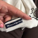 Brandy Melville  White Ribbed Black Detail Lettuce Hem Tank Photo 1