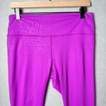 Fabletics Women's PowerHold High-Waisted 7/8 Legging in Kick Butt Fiesta Purple Photo 3