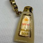Juicy Couture  Malibu Gold Sunscreen Tanning Oil Charm Photo 1