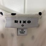 EUC RIXO women’s basketball team white cream black polka‎ dot ruffle lined dress Size XS Photo 3
