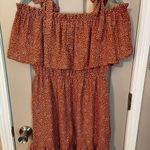 Liberty Love  tie shoulder ruffle mini dress.​ Photo 4