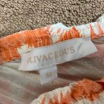 Olivaceous Top  Photo 2