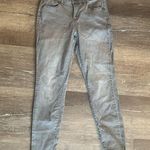 Old Navy  Mid Rise Rockstar Grey Skinny Jeans Photo 1