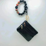 Carmella Card Coin Wristlet in Black Photo 1