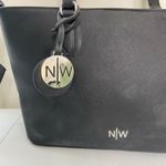Nine West solid black shoulder crossbody tote purse with attached keychain Photo 1