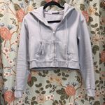 Brandy Melville  Light Blue Zip-Up Hoodie Photo 2