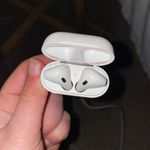Apple AirPods And Charging Case Photo 9