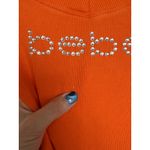 Bebe Logo Y2K Short Sleeve Logo Dress with Lace Up Back, XS, Dragon Fire Orange Photo 2