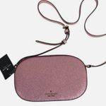 Kate Spade New York Glimmer Glitter Oval camera Bag Mitten pink Photo 0