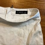 LIONESS Boutique White Mini Denim Skirt with Slit Photo 2