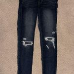 American Eagle  dark wash ripped knees super stretch skinny jeans Photo 0