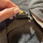 Ecru medium sized long cotton/suede cardigan with front pockets in GUC. Photo 2