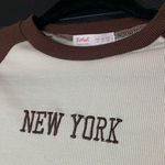 Two Tone Ribbed New York Baby Tee. EUC. Women’s size S. Photo 1