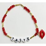 Sabrina Carpenter Taste Red and Gold Beaded Friendship Bracelet Photo 0