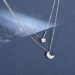 Elegant Silver Moon and Star Necklace Photo 0