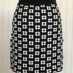 Princess Polly Adora Mini Skirt in Black with White Flowers Photo 4