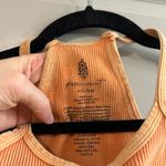 FP Movement Good Karma Happiness Runs Crop Tank Orange Size undefined Photo 1