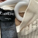 Bebe  off white body con dress Photo 2