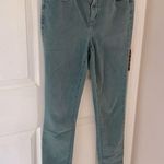 Loft  Skinny Ankle Mid-Rise Jeans in Muted Green Photo 4