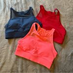 Zyia  One More Rep Sports Bras Red, Blue, and Pink Medium Photo 0