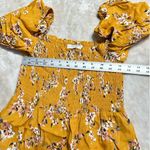 Flynn Skye Justine Romper Women's Small Orange Floral Puff Sleeve Smocked RTR Photo 6