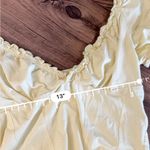 Topshop  pastel light yellow cropped ruffle sleeve top Photo 1