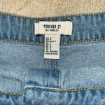 Forever 21  manufactured Distressed Denim Skirt, frayed hemline, buttons Photo 2