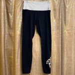 PINK - Victoria's Secret PINK Victoria’s Secret high waisted black/white leopard logo leggings, size M Photo 1