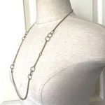 Long silver tone necklace with circles Photo 6