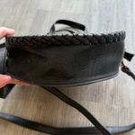 Free People  Round Vegan Leather Crossbody Bag in Black Photo 4