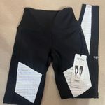 Alo Yoga Black and White Alo Leggings Photo 0