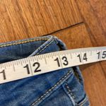 Universal Threads Universal Thread high rise skinny jeans raw hem size 27/4 Photo 5