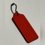 Coach Red Leather Hangtag 1941 with Carriage Stamped
FOB bag charm. Photo 1