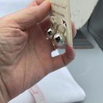 Do Everything In Love NWT  14K white gold plated Huggies globes. Photo 4