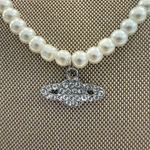 Elegant Fuax Pearl Necklace with Silver Saturn Pendant White Photo 1