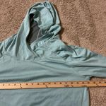 Patagonia  Women's Light Blue Lightweight Hooded Pullover Athletic Top Baselayer Photo 2